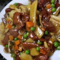 34. Beef with Oyster Sauce · Sauce made from delicate, buttery mollusk.