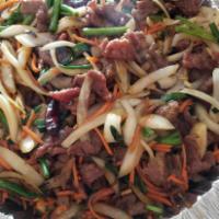 Mongolian Beef · Sauteed with green onion and hot pepper. Spicy.