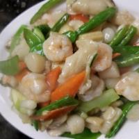 64. Happy Family · Shrimp, chicken, scallop with vegetables. A combination of different meat and seafood with m...