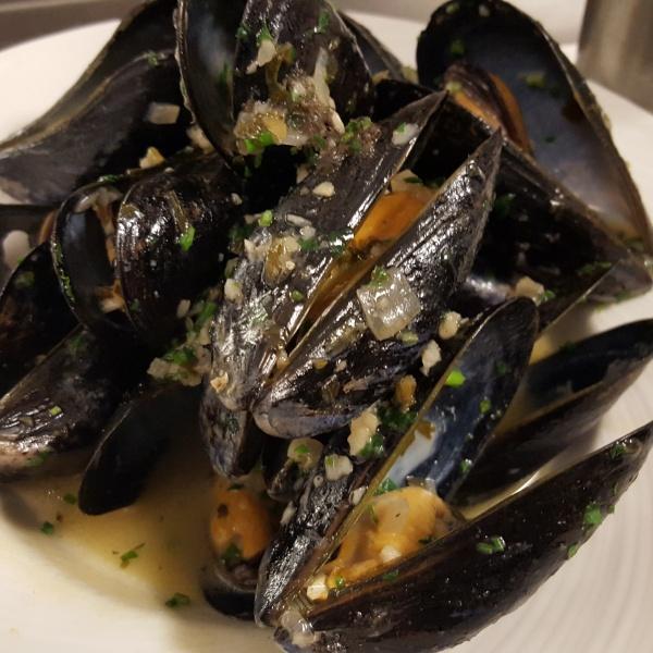 Mussels Mariniere · Domestic mussels steamed in white wine, shallots garlic, parsley, served with french fries.