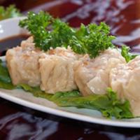 A2. Dumplings · Four pieces. Grounded pork and shrimp, our dumplings are served with a side of sweet and tan...
