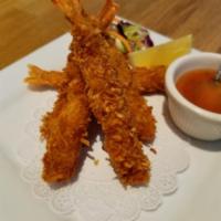 1. Coconut Shrimp · Shrimp deep fried in coconut breading. Served with sweet chili sauce. 5 Pieces.