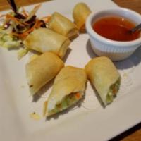 2. Crispy Egg Rolls · Golden-fried roll stuffed with glass noodles and vegetable. Served with sweet chili sauce.