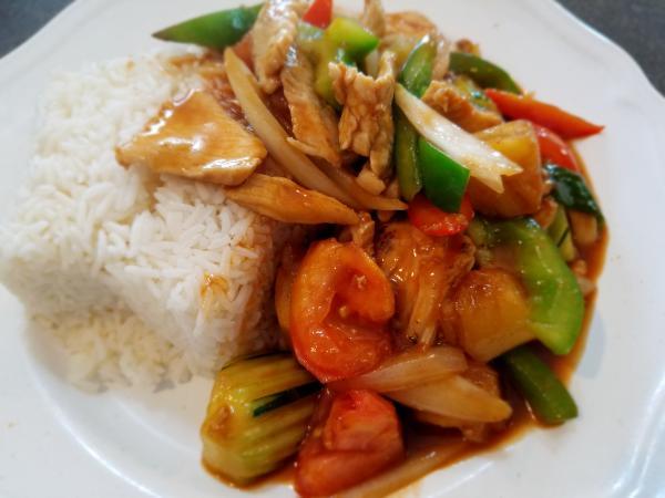 32.Slir-Fried Sweet and Sour · Stir-fried with pineapples, tomatoes, cucumbers, onions and bell peppers in sweet and sour sauce.