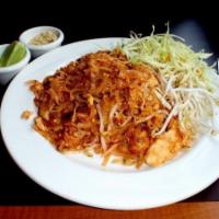 37. Pad Thai Noodles · Thai style stir-fried rice noodle with egg, bean sprout, green onions. Ground peanut.