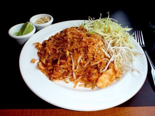 37. Pad Thai Noodles · Thai style stir-fried rice noodle with egg, bean sprout, green onions. Ground peanut.