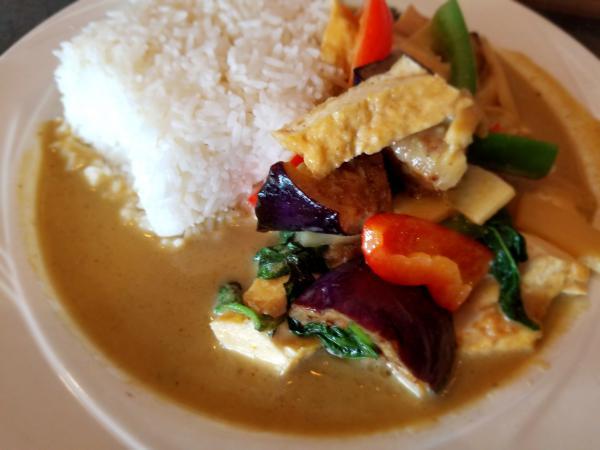 44. Green Curry · Bamboo shoots, eggplants, bell peppers, basil leaves in a green curry sauce. Spicy.