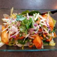 SP2. Crispy Tilapia with Green Apple Salad · Bite size crispy tilapia, shredded green apple, onions, lemongrass and fresh mints tossed wi...