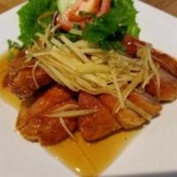 SP9. Honey-Ginger Duck · Deep fried crispy duck topped with fresh ginger stops, bell peppers and green onion in house...