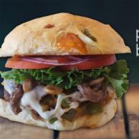Philly Burger · 100% beef patty piled high with sauteed steak, mushrooms, bell peppers, and onions. Then top...