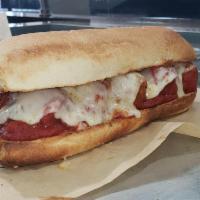 Meatball Sub · Sauteed meatballs marinated in a zesty marinara sauce, topped with Parmesan and Provolone ch...