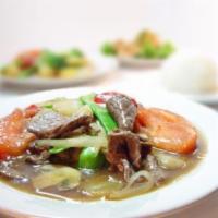 Thai Pepper Steak · Stir fried tender beef with bell peppers, tomatoes, mushrooms and onions in a special oyster...