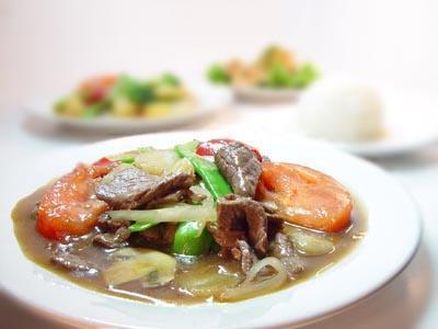 Thai Pepper Steak · Stir fried tender beef with bell peppers, tomatoes, mushrooms and onions in a special oyster sauce.