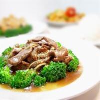 Beef & Broccoli · Stir fried beef with ginger served over broccoli in a delicate oyster sauce.