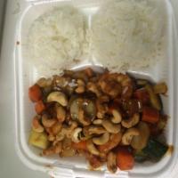 Cashew Chicken · Chicken, water chestnuts, carrots and zucchini stir fried in brown sauce topped with toasted...