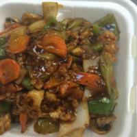 Spicy Chicken · Chicken with celery, green pepper and carrots stir fried in brown sauce. Served with steamed...