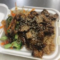 Teriyaki Chicken · Tender chicken breast served with teriyaki sauce, broccoli and carrots. Served with steamed ...
