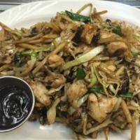 Moo Shu Chicken · Cabbage, bamboo shoots, green onions and mushrooms stir fried with chicken and egg in brown ...