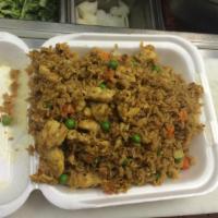 Spicy Basil Chicken Fried Rice · Blazing wok fried rice cooked with basil leaf, carrot, peas and eggs.