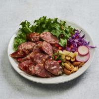 Isaan Sausage · Classic north eastern Thailand appetizer.