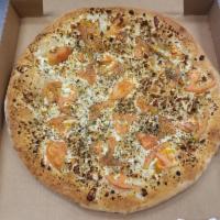 Feta Cheese Pizza · Olive oil, feta cheese, fresh tomatoes, and basil.