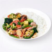 Vegetable Feast · An array of vegetables freshly wokd in your choice of sweet soy dark or white wine sauce. Sa...
