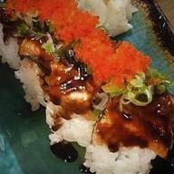 R17. Godzilla Roll · Spicy tuna, kani and avocado deep fried and topped with eel sauce.