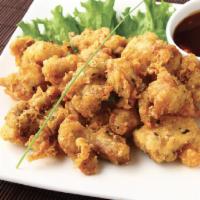 Sesame Chicken · Deep Fried Chicken served with house made spicy sauce