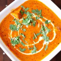 Chicken Makhani · Boiled boneless chicken cooked in a creamy tomato sauce.