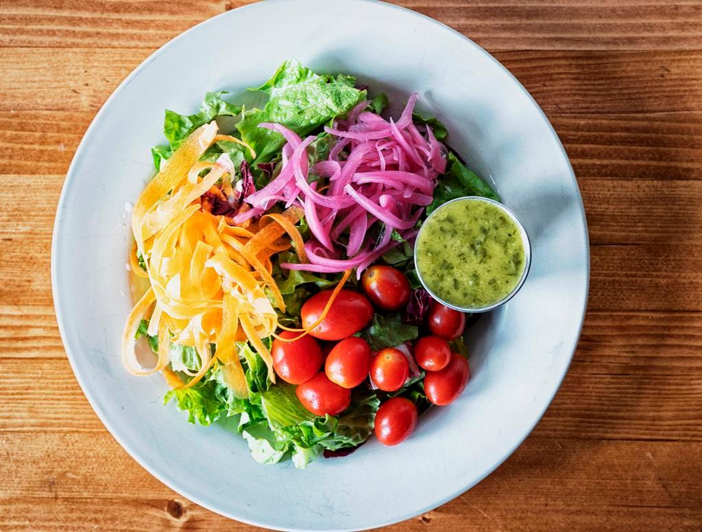 House Salad · Mixed greens, shredded carrots, pickled red onions, grape tomatoes with friar dressing.