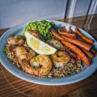 Sauteed Shrimp Plate · Served over rice pilaf with mushy peas and roasted carrots.