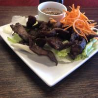 A16. Thai Beef Jerky · Fried marinated beef jerky served with spicy Thai style sauce.