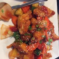 E2. Sweet and Sour · Sauteed cucumbers, pineapples, tomatoes, onions and bell peppers in sweet and sour sauce.