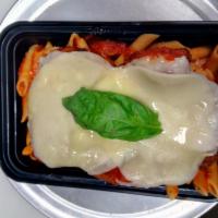 Penne with Chicken Cutlet L.G. · Fresh homemade plum tomatoes, basil and Parmesan cheese with tomato sauce. Served with slice...