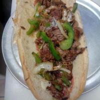 Cheese Steak Bomb.  L.G. · Traditional style steak with peppers, mushrooms, salami onions and American cheese.