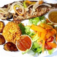 Red Snapper · Whole red snapper fish deep fried. Served  with salad, plantains and rice.