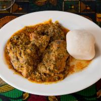 Egusi with Fish or Goat · Slices of tender goat meat or fish cooked in a tasty broth of ground melon seeds (Egusi) and...