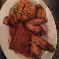 Mama's Platter · Combination of wings, fish or beef (choose 2) with rice and plantains.