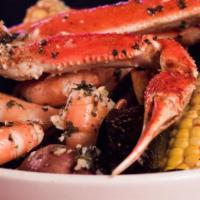 Steamer Bowl · Cluster of snow crab, one dozen large shrimp, and a half pound of Chilean mussels. Served wi...