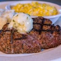 Beef Tenderloin Filet · Aged 8 oz. filet, signature Rockfish spice, garlic butter, loaded red potatoes, and sauteed ...