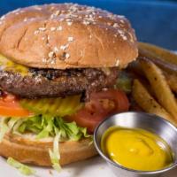 Kid's Cheeseburger · A quarter lb. burger topped with cheddar Jack cheese served on a toasted bun. Choice of one ...