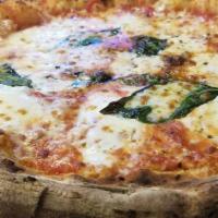 Margherita Pizza · Crushed tomatoes, house mozzarella, extra virgin olive oil and fresh basil.