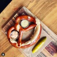 GIANT BAVARIAN PRETZEL · HOMEMADE MUSTARD AND BEER CHEESE DIP, PICKLES