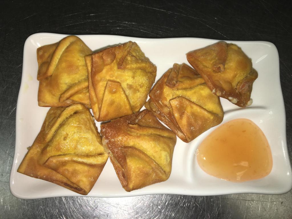 B4. Fried Crab Cheese Wontons 炸蟹角（6） · Homemade crab and cream cheese filling wrapped and deep-fried. Each order comes with six.