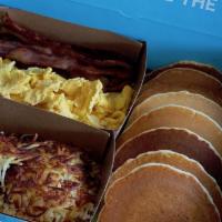 American Breakfast Family Meal · 8 Buttermilk Pancakes, 12 Scrambled Eggs, 10 pieces of Premium Bacon, Hashbrowns.