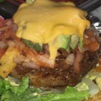 Baja Specialty Burger · Sliced avocado, spicy pico de gallo, crumbled corn chips and beef chili with melted cheese o...
