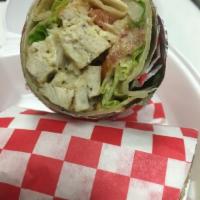 Caesar Chicken Wrap · Grilled chicken marinated in Caesar dressing with lettuce tomatoes, onions and Parmesan chee...