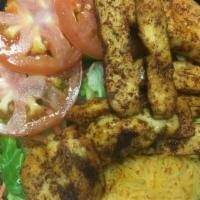 Spicy Chicken Salad · Grilled chicken marinated in Cajun spices over a bed of romaine heart lettuce, tomatoes, car...