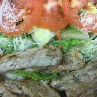 Chicken Caesar Salad · Grilled chicken marinated in Caesar dressing over a bed of romaine heart lettuce, carrots, t...