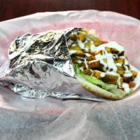 Chicken Shawarma Pita · Grilled marinated chicken breast sauteed with hot sauce and lemon juice served on a hot pita...